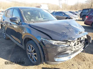 2017 Mazda CX-5 Grand Touring with VIN JM3KFBDL0H0104806, listed as a IAAI auction lot 41621964 with 60,728 mi miles. Bid and sale history available at carsss.com. Image 19.