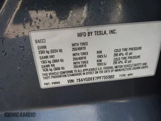 2023 Tesla Model Y Long Range with VIN 7SAYGDEE7PF755980, listed as a IAAI auction lot 41781433 with 31,427 mi miles. Bid and sale history available at carsss.com. Image 9.