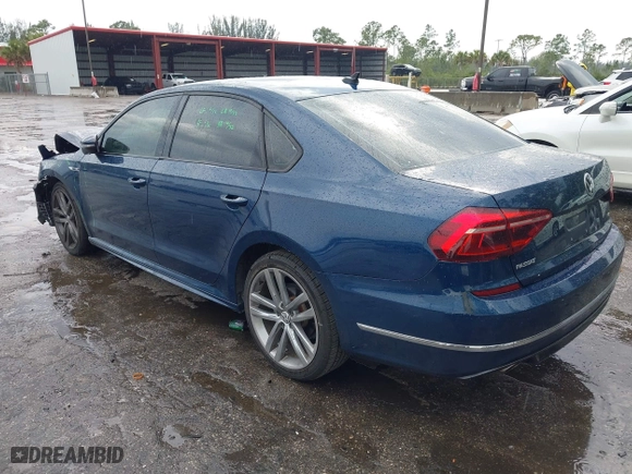 2018 Volkswagen Passat 2.0T S with VIN 1VWAA7A30JC021740, listed as a IAAI auction lot 41887035 with 65,227 mi miles. Bid and sale history available at carsss.com. Image 3.