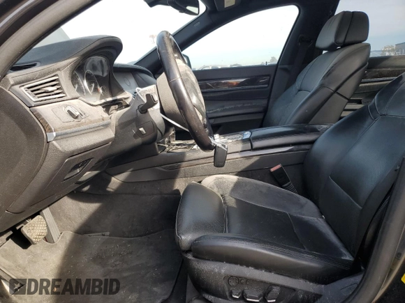 2012 BMW 7 Series 750i with VIN WBAKA8C58CDS99694, listed as a Copart auction lot 46828435 with 131,458 mi miles and Salvage title. Bid and sale history available at DreamBid. Image 7.