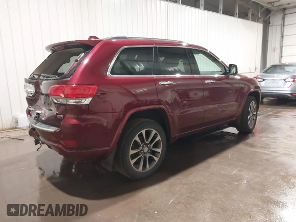 2018 Jeep Grand Cherokee High Altitude with VIN 1C4RJFCG6JC215902, listed as a IAAI auction lot 41866716 with 76,282 mi miles. Bid and sale history available at carsss.com. Image 4.