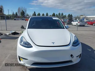 2022 Tesla Model Y Long Range with VIN 7SAYGDEE0NF340822, listed as a IAAI auction lot 41881224 with Not Provided miles and . Bid and sale history available at DreamBid. Image 13.