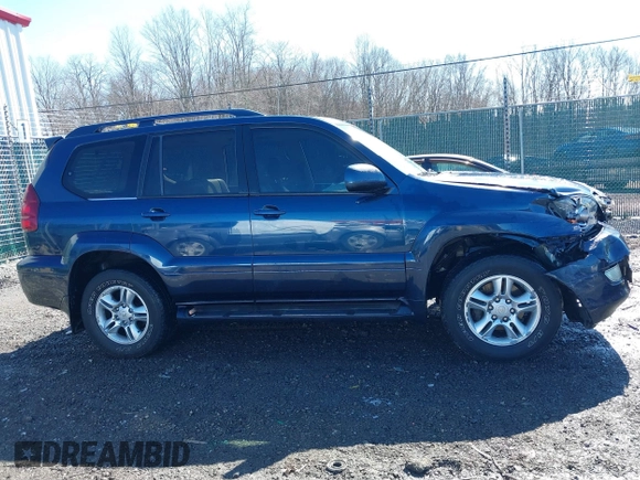 2005 Lexus GX with VIN JTJBT20XX50081621, listed as a IAAI auction lot 41661384 with 208,071 mi miles. Bid and sale history available at carsss.com. Image 13.