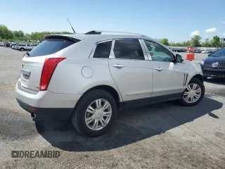 2014 Cadillac SRX Luxury Collection z VIN 3GYFNEE37ES630832, wystawiony jako Copart lot #56335035 z przebiegiem 102 076 mil mil oraz Szkody całkowita. Historia ofert i sprzedaży dostępna na DreamBid. Obrazek 3.