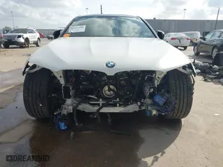 2020 BMW M5 Competition with VIN WBSJF0C08LB448907, listed as a IAAI auction lot 41433298 with 47,956 mi miles. Bid and sale history available at carsss.com. Image 6.