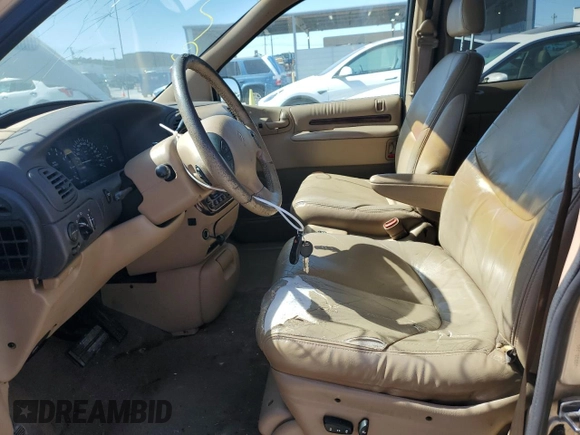 2000 Chrysler Town & Country LXi with VIN 1C4GP54L4YB614402, listed as a Copart auction lot 76287524 with 188,784 mi miles and Clean Title. Bid and sale history available at carsss.com. Image 7.