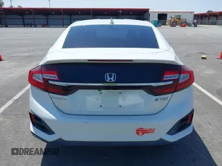 2018 Honda Clarity z VIN JHMZC5F10JC015706, wystawiony jako IAAI lot #42290573 z przebiegiem 158 987 mil mil oraz . Historia ofert i sprzedaży dostępna na DreamBid. Obrazek 16.