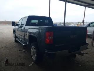 2017 GMC Sierra 2500HD SLT with VIN 1GT12TEY3HF232700, listed as a IAAI auction lot 41381275 with 217,148 mi miles. Bid and sale history available at carsss.com. Image 3.