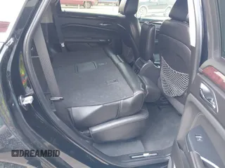 2013 Cadillac SRX Luxury Collection z VIN 3GYFNCE31DS648973, wystawiony jako IAAI lot #42208689 z przebiegiem 176 115 mil mil oraz . Historia ofert i sprzedaży dostępna na DreamBid. Obrazek 8.