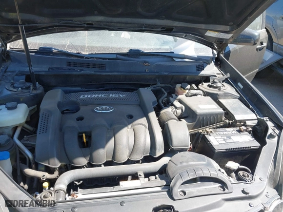 2008 Kia Optima LX with VIN KNAGE123985242231, listed as a IAAI auction lot 41838786 with 217,754 mi miles. Bid and sale history available at carsss.com. Image 10.