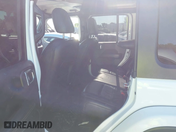 2018 Jeep Wrangler Unlimited Sahara z VIN 1C4HJXEG4JW106111, wystawiony jako IAAI lot #41994833 z przebiegiem 99 583 mil mil oraz . Historia ofert i sprzedaży dostępna na DreamBid. Obrazek 8.