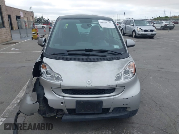 2009 Smart fortwo Pure z VIN WMEEJ31X99K209322, wystawiony jako IAAI lot #42465179 z przebiegiem 75 730 mil mil oraz . Historia ofert i sprzedaży dostępna na DreamBid. Obrazek 12.