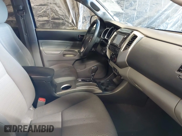 2014 Toyota Tacoma with VIN 3TMLU4EN4EM156933, listed as a IAAI auction lot 41197904 with 128,183 mi miles. Bid and sale history available at carsss.com. Image 5.