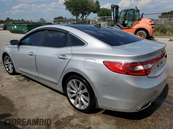 2013 Hyundai Azera z VIN KMHFH4JG8DA213103, wystawiony jako Copart lot #57781955 z przebiegiem 173 515 mil mil oraz Czysty tytuł • Clean title. Historia ofert i sprzedaży dostępna na DreamBid. Obrazek 2.