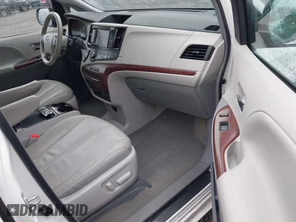 2014 Toyota Sienna XLE with VIN 5TDYK3DC2ES485846, listed as a IAAI auction lot 41693092 with 106,156 mi miles and . Bid and sale history available at DreamBid. Image 5.