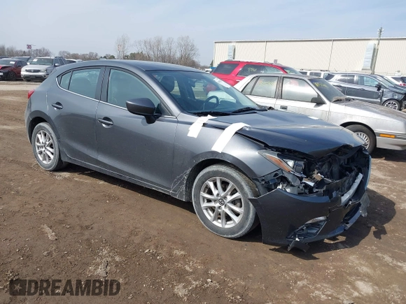 2014 Mazda 3 i Grand Touring with VIN JM1BM1M74E1212699, listed as a IAAI auction lot 41804428 with 195,472 mi miles and . Bid and sale history available at DreamBid. Image 1.