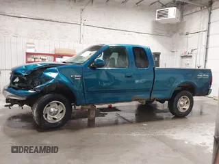 2000 Ford F-150 XL z VIN 1FTRX18L7YKB27657, wystawiony jako IAAI lot #42262373 z przebiegiem Nie podano mil oraz . Historia ofert i sprzedaży dostępna na DreamBid. Obrazek 14.