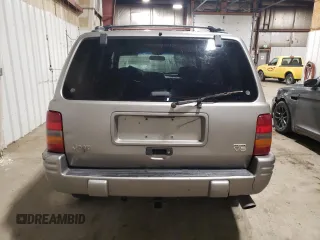 1998 Jeep Grand Cherokee Limited with VIN 1J4GZ88Z1WC289820, listed as a Copart auction lot 88583995 with 245,572 mi miles and Clean Title. Bid and sale history available at carsss.com. Image 6.