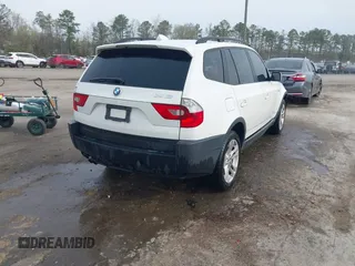 2005 BMW X3 3.0i with VIN WBXPA934X5WD13064, listed as a IAAI auction lot 41920713 with 283,592 mi miles. Bid and sale history available at carsss.com. Image 4.