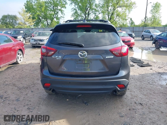 2016 Mazda CX-5 Grand Touring with VIN JM3KE4DYXG0724183, listed as a IAAI auction lot 42176009 with 152,695 mi miles and . Bid and sale history available at DreamBid. Image 16.