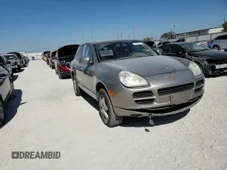 2006 Porsche Cayenne S with VIN WP1AB29P26LA61060, listed as a Copart auction lot 77146574 with 100,216 mi miles and Salvage Title. Bid and sale history available at carsss.com. Image 12.