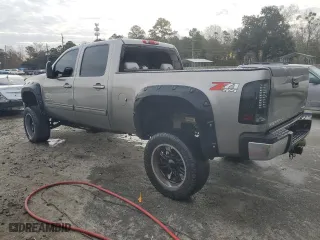 2009 GMC Sierra 2500HD SLT with VIN 1GTHK63679F154246, listed as a Copart auction lot 76985313 with 0 mi miles and Salvage Title. Bid and sale history available at carsss.com. Image 2.