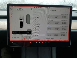 2023 Tesla Model Y Long Range z VIN 7SAYGAEE0PF693613, wystawiony jako Copart lot #54452895 z przebiegiem 19 574 mil mil oraz Szkoda całkowita • Salvage title. Historia ofert i sprzedaży dostępna na DreamBid. Obrazek 9.