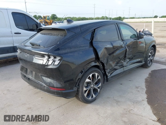 2023 Ford Mustang Mach-E Premium with VIN 3FMTK3SU2PMA97987, listed as a IAAI auction lot 42618167 with 37,904 mi miles and . Bid and sale history available at DreamBid. Image 4.