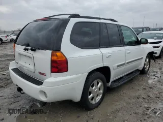 2004 GMC Envoy SLT with VIN 1GKDT13SX42404837, listed as a Copart auction lot 84515994 with 184,153 mi miles and Salvage Title. Bid and sale history available at carsss.com. Image 3.