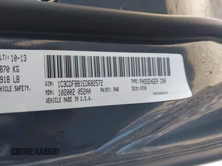 2014 Dodge Dart SXT with VIN 1C3CDFBB1ED682572, listed as a IAAI auction lot 42059940 with 128,593 mi miles. Bid and sale history available at carsss.com. Image 9.