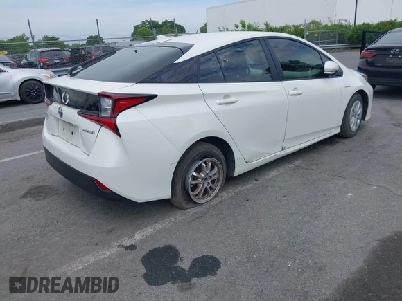 2019 Toyota Prius L Eco z VIN JTDKARFU3K3102222, wystawiony jako IAAI lot #42291403 z przebiegiem 27 669 mil mil oraz . Historia ofert i sprzedaży dostępna na DreamBid. Obrazek 4.
