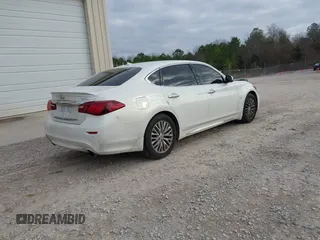 2015 Infiniti Q70 with VIN JN1BY1PP5FM601628, listed as a IAAI auction lot 41510075 with 102,363 mi miles and . Bid and sale history available at DreamBid. Image 4.