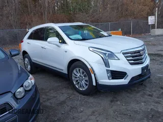 2017 Cadillac XT5 FWD with VIN 1GYKNARS2HZ283068, listed as a IAAI auction lot 41004450 with 98,129 mi miles. Bid and sale history available at carsss.com. Image 1.