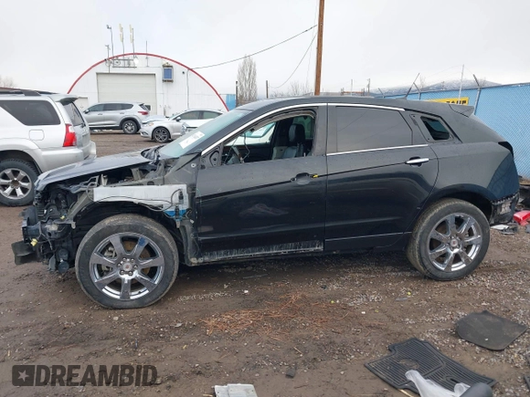 2012 Cadillac SRX Premium Collection with VIN 3GYFNFE35CS599969, listed as a IAAI auction lot 41764337 with 154,864 mi miles and . Bid and sale history available at DreamBid. Image 15.