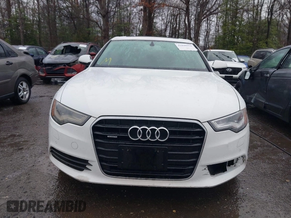 2013 Audi A6 Premium Plus z VIN WAUGGAFC8DN032850, wystawiony jako IAAI lot #41848654 z przebiegiem 183 063 mil mil oraz . Historia ofert i sprzedaży dostępna na DreamBid. Obrazek 12.