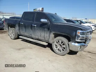 2015 Chevrolet Silverado 1500 LT with VIN 3GCPCRECXFG472109, listed as a Copart auction lot 48809145 with 155,486 mi miles and Salvage Title. Bid and sale history available at DreamBid. Image 4.