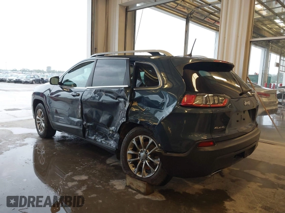 2019 Jeep Cherokee Latitude Plus with VIN 1C4PJMLX0KD361879, listed as a IAAI auction lot 40435950 with 148,830 mi miles. Bid and sale history available at carsss.com. Image 3.