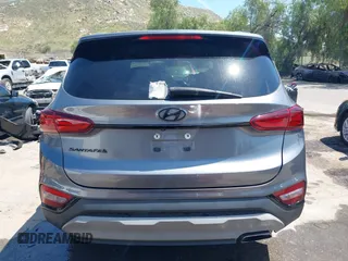 2019 Hyundai Santa Fe SE with VIN 5NMS23AD7KH009688, listed as a IAAI auction lot 41991686 with 77,942 mi miles and . Bid and sale history available at DreamBid. Image 17.
