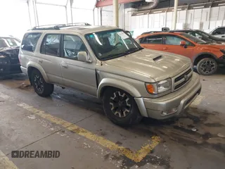 2000 Toyota 4Runner SR5 z VIN JT3HN86R6Y0294870, wystawiony jako IAAI lot #42131835 z przebiegiem 292 259 mil mil oraz . Historia ofert i sprzedaży dostępna na DreamBid. Obrazek 1.