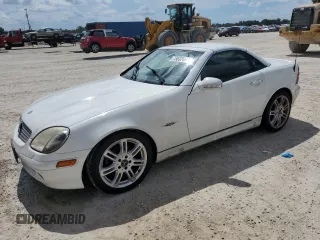 2004 Mercedes-Benz SLK-Class with VIN WDBKK49F54F305769, listed as a Copart auction lot 73852484 with 73,946 mi miles and Salvage Title. Bid and sale history available at carsss.com. Image 1.