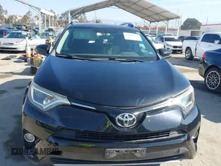 2016 Toyota RAV4 XLE with VIN 2T3RFREV6GW459313, listed as a IAAI auction lot 42074337 with 149,914 mi miles and . Bid and sale history available at DreamBid. Image 12.