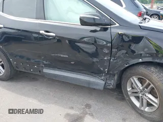 2017 Hyundai Santa Fe 2.4L with VIN 5NMZUDLB4HH030064, listed as a IAAI auction lot 42288147 with 89,297 mi miles and . Bid and sale history available at DreamBid. Image 6.