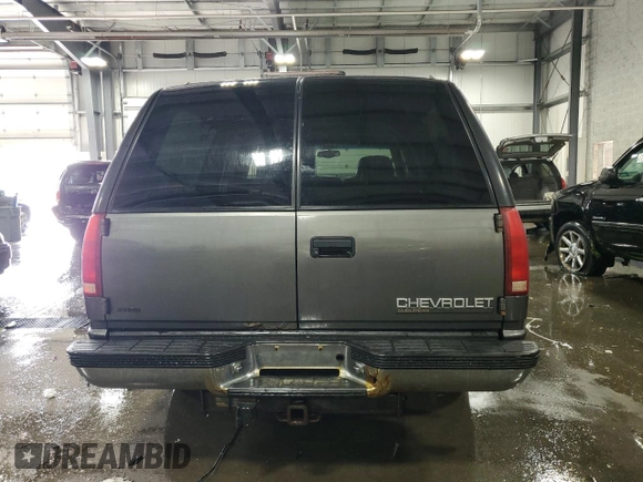 1999 Chevrolet Suburban with VIN 3GNFK16R8XG149091, listed as a Copart auction lot 71300024 with 254,044 mi miles and Salvage Title. Bid and sale history available at carsss.com. Image 6.