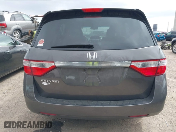 2012 Honda Odyssey EX-L with VIN 5FNRL5H60CB081866, listed as a IAAI auction lot 41835701 with 151,236 mi miles and . Bid and sale history available at DreamBid. Image 16.