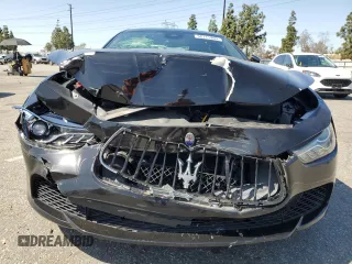 2017 Maserati Ghibli S с VIN ZAM57RSA1H1212595, выставлен на аукционе Copart как лот 52111405 с пробегом 55 158 миль миль и Списание • Salvage title. История ставок и продаж доступна на DreamBid. Изображение 5.