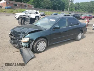 2001 Honda Accord LX with VIN 1HGCG56441A013329, listed as a Copart auction lot 59774115 with 243,745 mi miles and Salvage title. Bid and sale history available at DreamBid. Image 1.