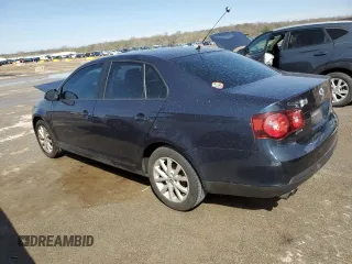 2010 Volkswagen Jetta S with VIN 3VWJX7AJ0AM010958, listed as a Copart auction lot 51334955 with 178,684 mi miles and Salvage title. Bid and sale history available at DreamBid. Image 2.
