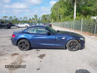 2009 BMW Z4 sDrive35i with VIN WBALM73579E165199, listed as a IAAI auction lot 41696215 with 1 mi miles. Bid and sale history available at carsss.com. Image 13.
