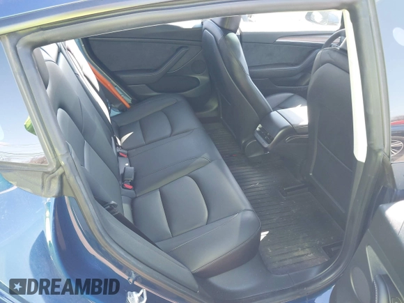 2023 Tesla Model 3 with VIN 5YJ3E1EA2PF690335, listed as a IAAI auction lot 41732701 with 22,238 mi miles and . Bid and sale history available at DreamBid. Image 8.