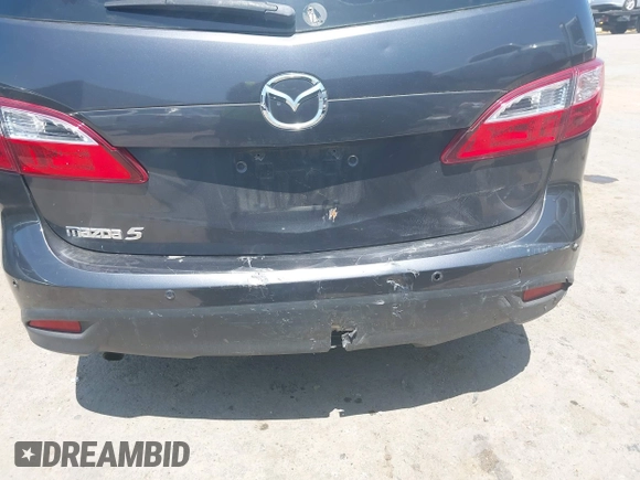 2014 Mazda 5 Grand Touring with VIN JM1CW2DL8E0171095, listed as a IAAI auction lot 41962650 with 85,048 mi miles and . Bid and sale history available at DreamBid. Image 6.